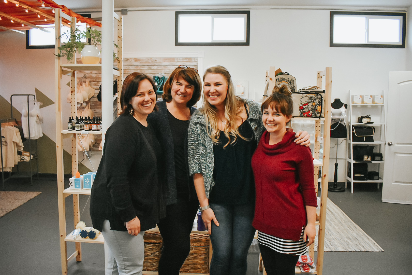 Photo of Fern + Foster founders Danielle (far left) and Emily (far right), with Nurturing Expressions founder Tracy Corey (mid-left) and staff Jenn